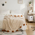 Pom Pom Weave Blanket